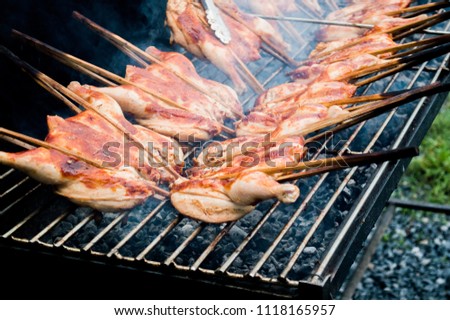 Chicken breasts on a grill, real picture, Selective focus