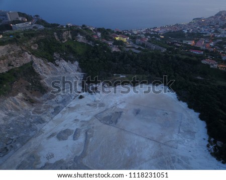 Aerial drone image of an active volcanic crater known as Sulfatara in Pozzuoli next to Naples in the South of Italy.