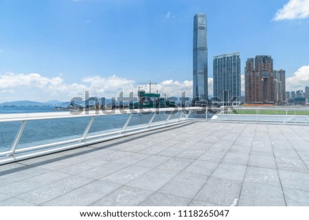 empty square with panoramic city skyline
