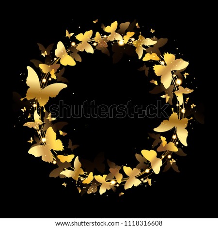 wreath of golden butterflies on a black background