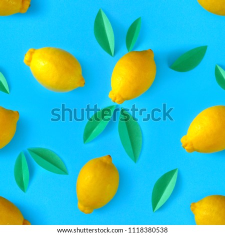 pattern with photo of lemons on a saturated blue background. use for postcards, cards, wedding, wallpapers, textiles, scrapbooking, decoration, invitations, background, holiday.