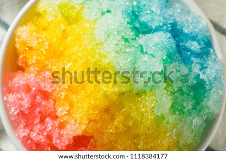 Sweet Homemade Shaved Rainbow Hawaiian Ice in a Bowl Royalty-Free Stock Photo #1118384177