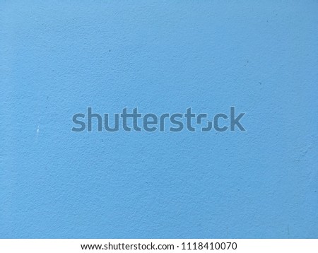 Abstract light blue concrete wall background and texture