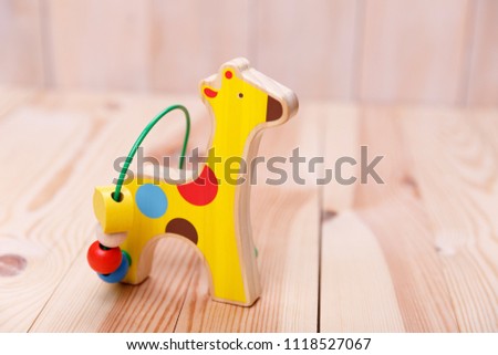 A wooden toy in the form of horse