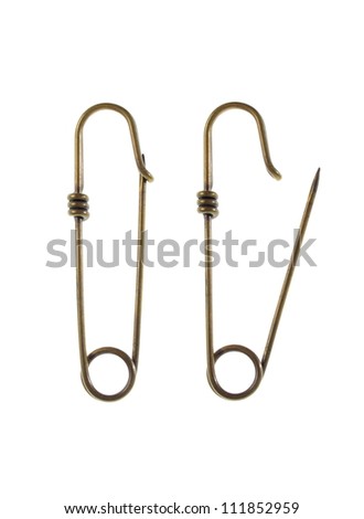Old Safety Pin,  jewelery studio isolated photo