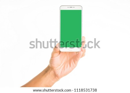 Side view of relaxed left hand of young human male hold beautiful modern blank screen smartphone in a palm isolated on abstract blurred white background. Detailed closeup studio shot