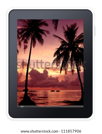 Tablet pc computer with sunset background