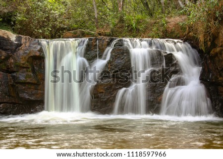 beautiful waterfall front view, low speed photo