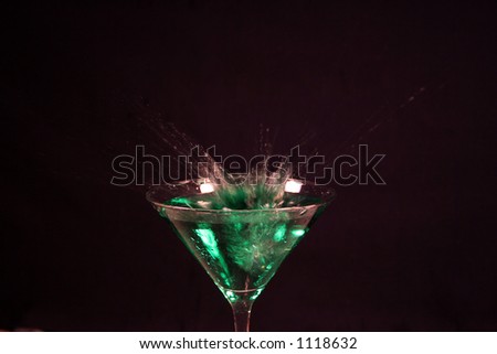 A splash in a cocktail drink