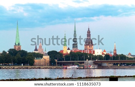 View on historical center of old Riga - the capital of Latvia and the largest Baltic city with unique medieval and Gothic architecture. Riga is popular tourist destination that offers many recreatio