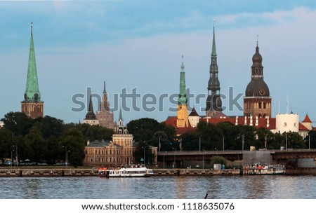 View on historical center of old Riga - the capital of Latvia and the largest Baltic city with unique medieval and Gothic architecture. Riga is popular tourist destination that offers many recreatio