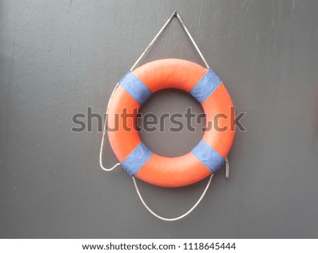 Lifebouy on the wall.