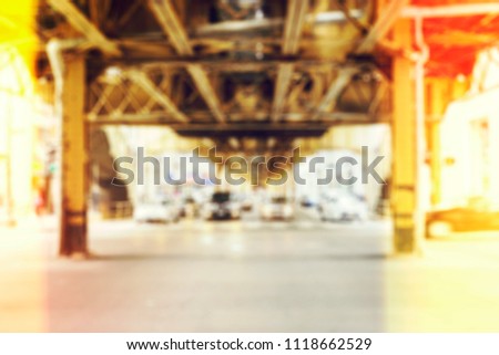 Blurred background of Chicago downtown with the elevated loop train