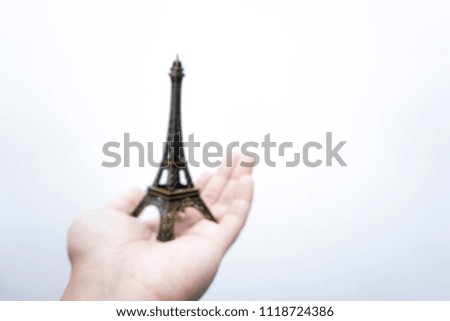 model of The Eiffel Tower in Paris, France isolated on white. concept of vacation and holiday.