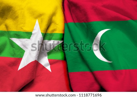 Myanmar and Maldive flag on cloth texture