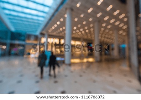 Blur photo. department store or shopping mall/airport for background. Poster.