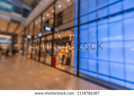 Blur photo. department store or shopping mall/airport for background. Poster.