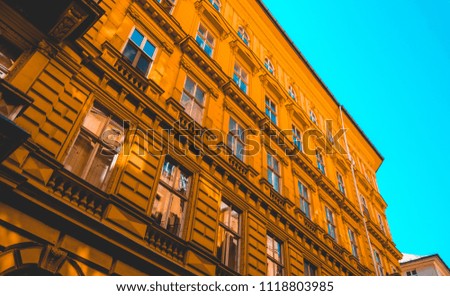 colorful picture of orange apartment building at hungary