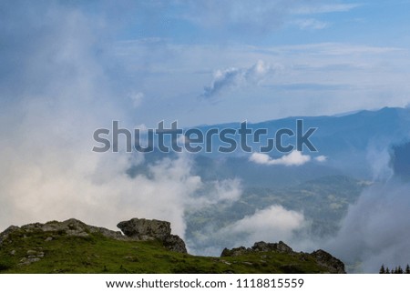 Misty scenery in the mountains in summer
