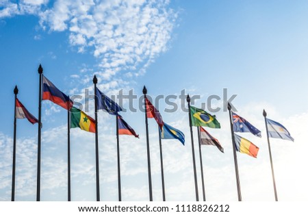 national flags under the  blue sky