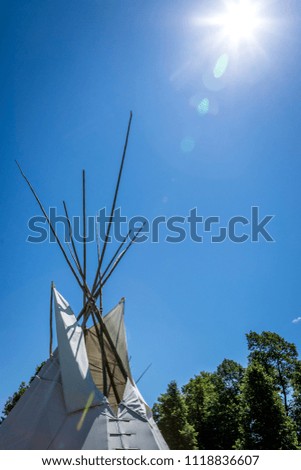 Aboriginal teepee illuminated by the sun