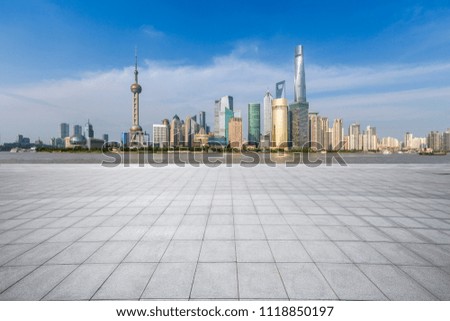 Panoramic skyline and buildings with empty concrete square floor，shanghai city，china