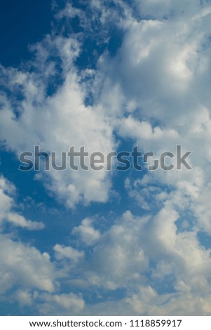 Sunny day, blue sky and white clouds, background for design