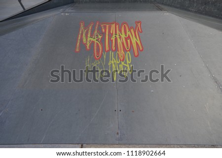 Drawing of Mathew was here tagged in urban graffiti on a flat ramp