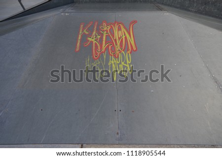Drawing of Kaison was here tagged in urban graffiti on a flat ramp