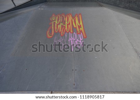 Drawing of Jeremy was here tagged in urban graffiti on a flat ramp