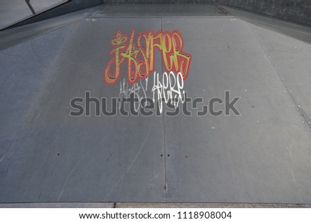 Drawing of Jasper was here tagged in urban graffiti on a flat ramp