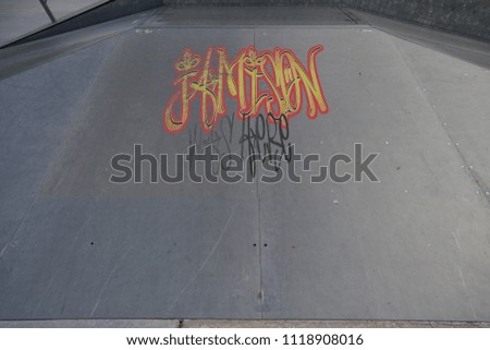 Drawing of Jamison was here tagged in urban graffiti on a flat ramp