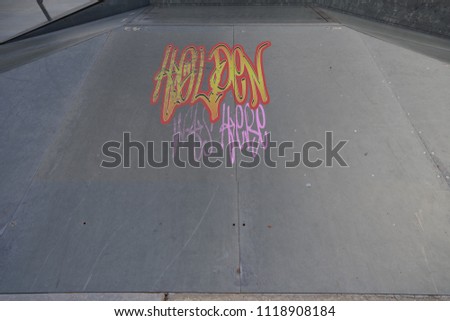 Drawing of Holden was here tagged in urban graffiti on a flat ramp