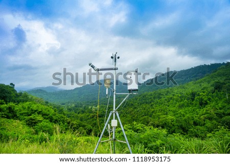 Weather meter with mountain background