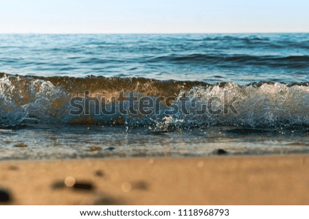 sea water foam, sea wave, the excitement on the shore sea, the water is boiling