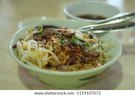 A bokeh picture of mee poh serve during breakfast in Kuching,Sarawak.