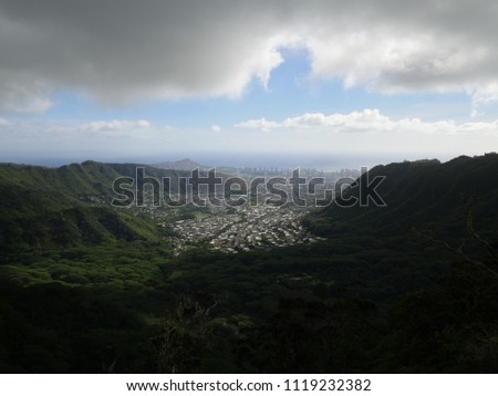 Manoa town Honolulu city view from the mountain with diamond head on a cloudy sunny day