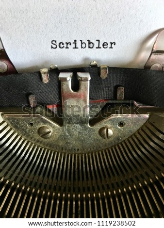 Scribbler, writer terminology, typed in black ink on vintage manual typewriter machine