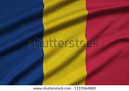 Chad flag  is depicted on a sports cloth fabric with many folds. Sport team banner