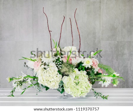 Flower background with hortensias (hydrangea), carnations and roses. 