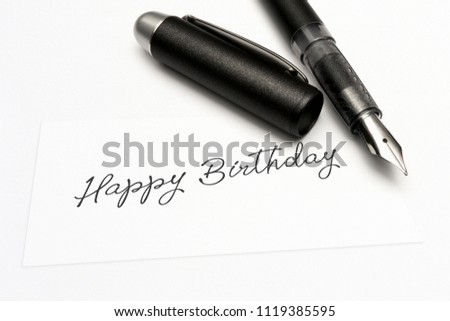 close-up of a greeting card with the sweet word, happy birthday