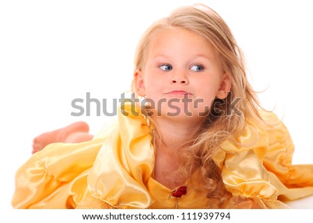 A picture of an adorable little girl looking with curiosity over white background