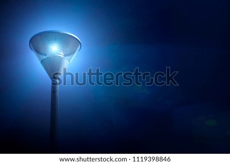 Lantern in the street lights up bright at night