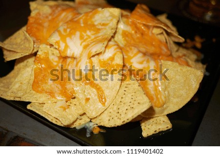 Nachos with cheddar cheese