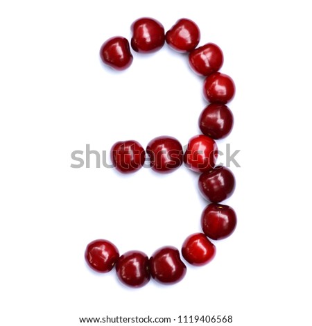 Number three. A figure composed of cherries isolated on a white background.