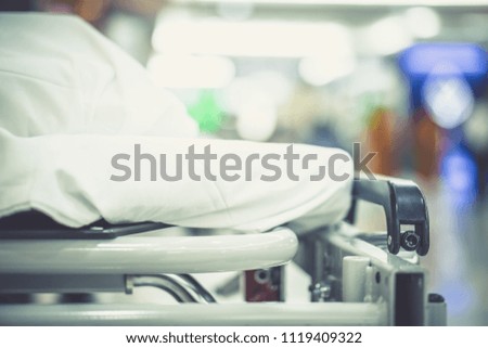 Blur hospital Background with patient on bed and wheelchair waiting in hallway. showing quality of healthcare service for illness old elder sick people with support from professional nurse and doctor 