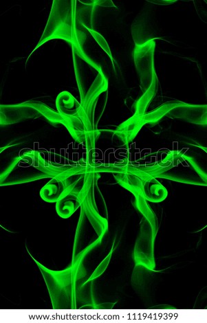 Smoke the green incense on a black background. darkness concept