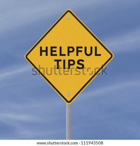 Road sign indicating Helpful Tips (against a blue sky background)