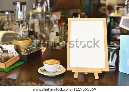 Blank white Menu Frame on Wooden in cafe shop for Design Mockup Template. 