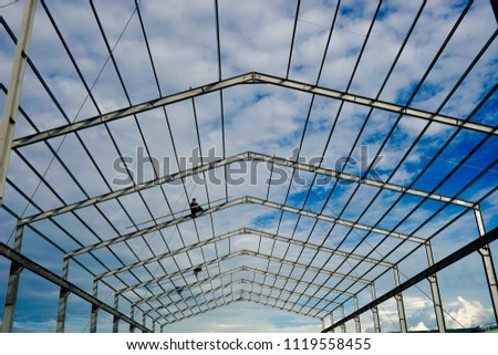 Worker is working on Steel frame structure